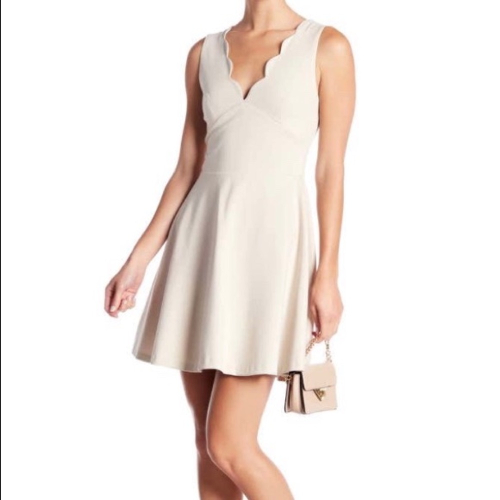 Scalloped v-neck mini fit and flare dress